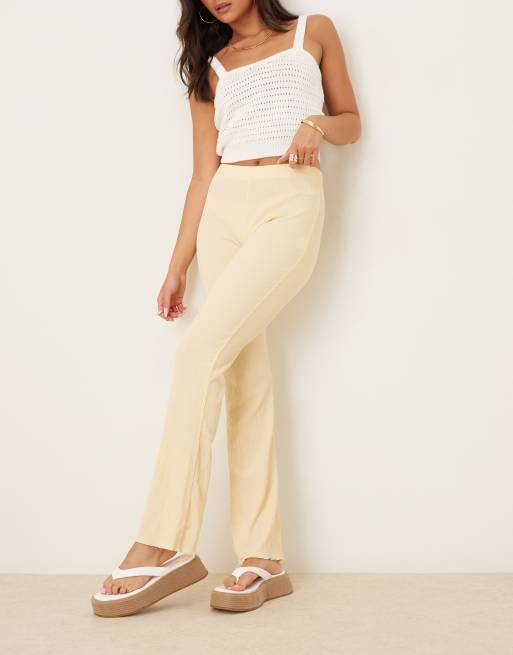 ASOS DESIGN - Flare broek van kreukelstof in lichtgeel, 4 van 5