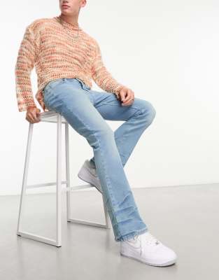 Asos Design Flare Jeans With Distressed Wash-blue In Blue