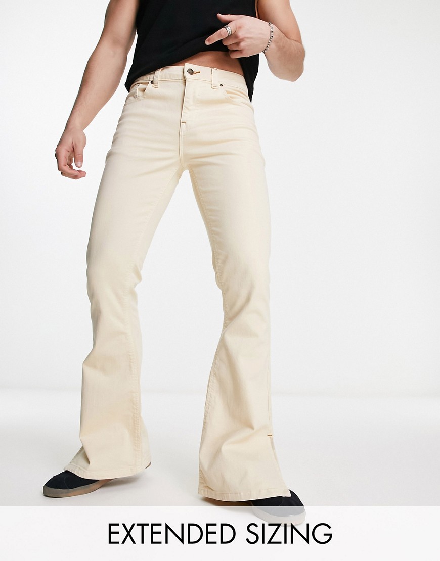 ASOS DESIGN flare jeans with spilt hems in ecru-White