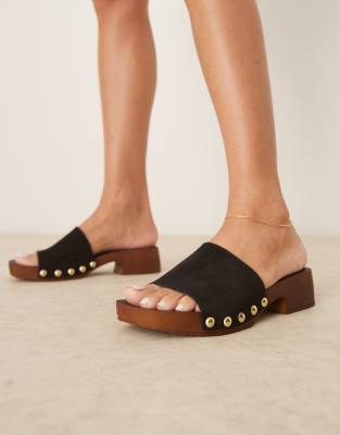 ASOS DESIGN - Flare - Mules-Sandalen im Clogs-Stil aus hochwertigem Wildleder in Schwarz