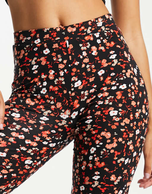 ASOS DESIGN flare pants in floral print in red