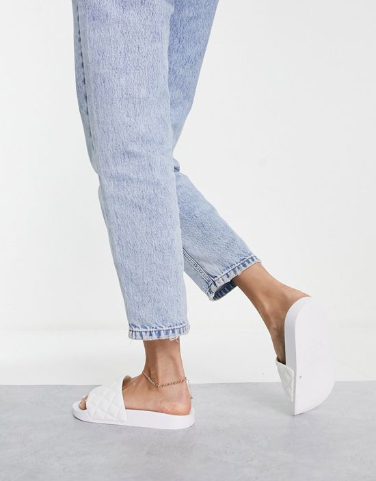 https://images.asos-media.com/products/asos-design-flare-quilted-sliders-in-white/201126446-2?$n_550w$&wid=550&fit=constrain