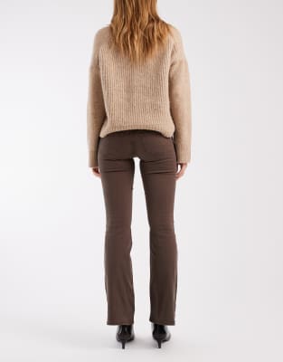 Asos Design Flare Stretch Jeans With Button Tab Detailing In Multi