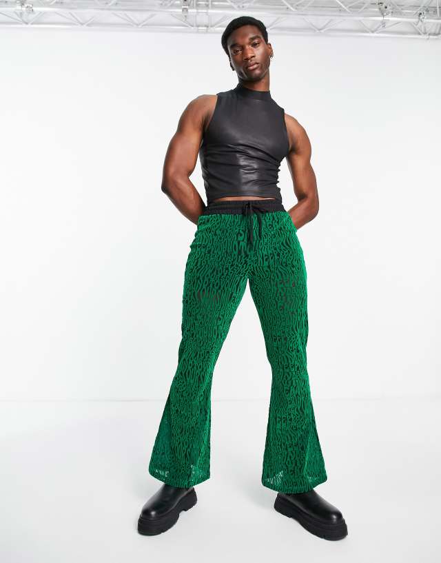 ASOS DESIGN flare sweatpants in green velour burnout