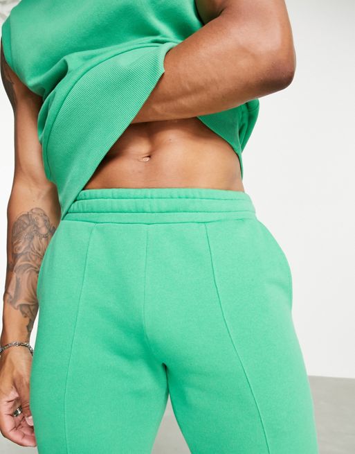 ASOS DESIGN flared sweatpants in forest green