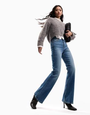 Asos Design Tall Flared Jeans In Mid Blue In Blue