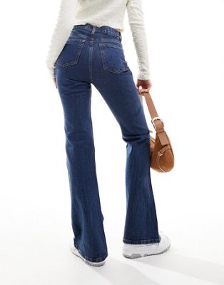 ASOS DESIGN flared jeans in dark blue - ASOS Price Checker