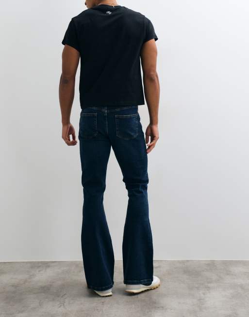 ASOS DESIGN flared jeans in dark wash blue, 3 of 5