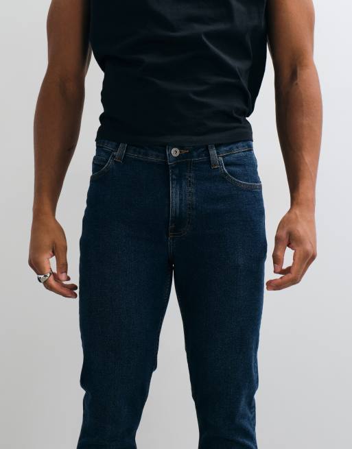 ASOS DESIGN flared jeans in dark wash blue, 4 of 5