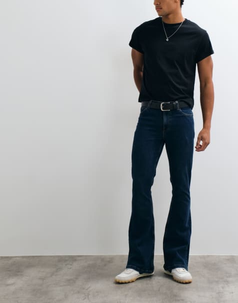 ASOS DESIGN flared jeans in donkerblauwe wassing - view 1
