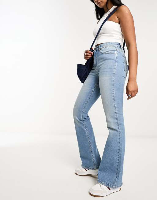 ASOS DESIGN Tall flared jeans in dark blue