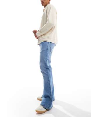 Asos Design Flared Jeans In Blue