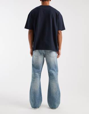 Asos Design Flared Jeans In Blue