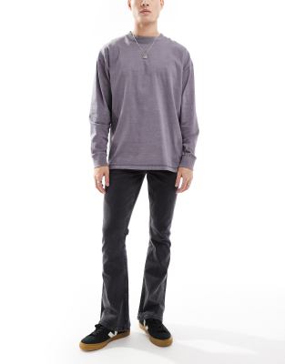 Asos Design Flared Jeans In Wash Black