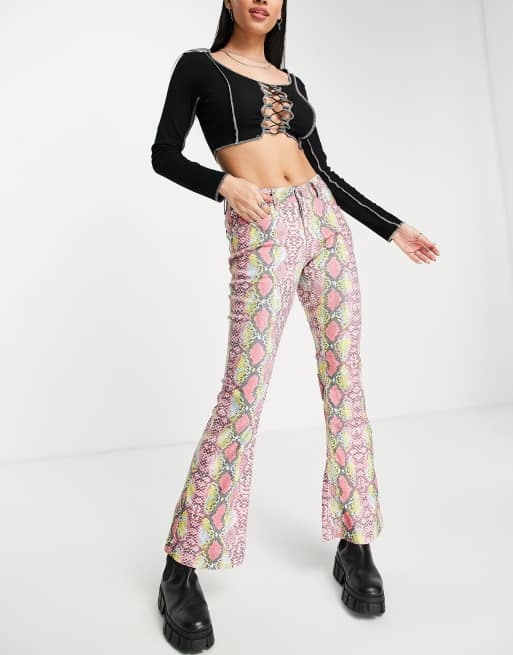 Flared store pants slangenprint