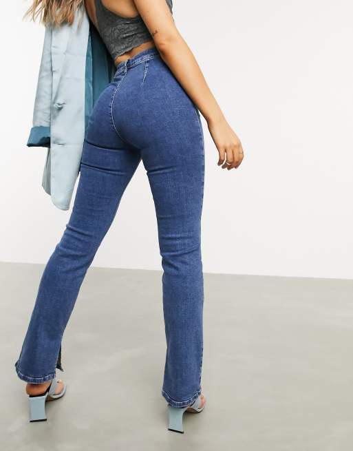 ASOS DESIGN - Flared jeans met stretch en hoge taille in jaren 2000-stijl in midwash