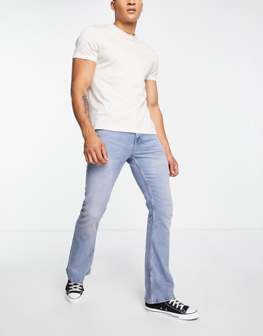 ASOS DESIGN - Flared jeans met stretch en vintage lichtblauwe wassing 