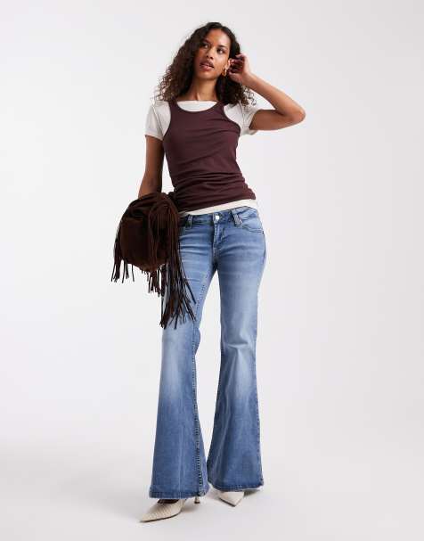 ASOS DESIGN - Flared jeans met ultra lage taille in blauw met vale wassing - view 1