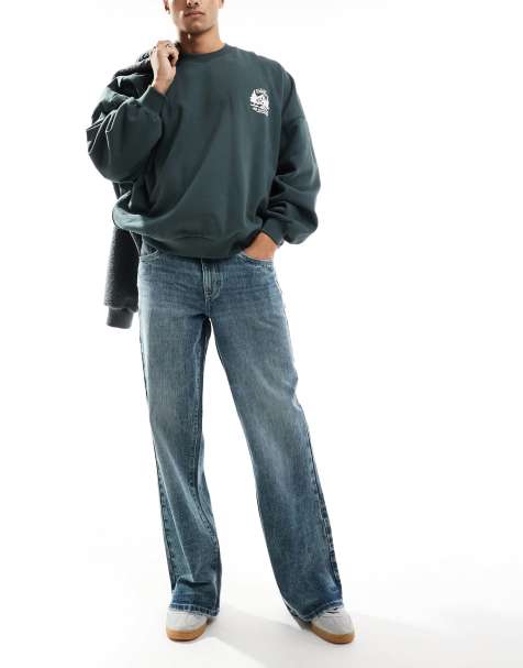 ASOS DESIGN - Flared jeans met wassing in grijsblauw - view 1