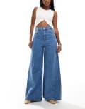 [ASOS DESIGN] ASOS DESIGN flared jeans with godet in mid-wash-Blue 14 Blue