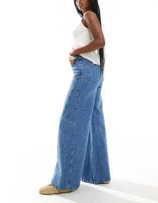 Asos Design Flared Jeans With Godet In Blue