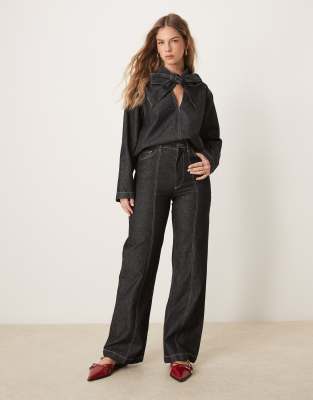 flared jeans with twin needle details in black