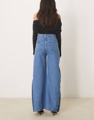Asos Design Flared Jeans With Two-tone Panels-blue In Blue