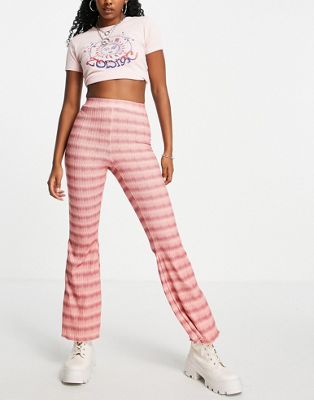 ASOS DESIGN flared pants in ombre texture in pink and yellow | ASOS