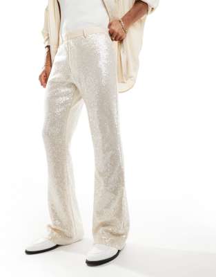 flared sequin dress pants in white-Gold