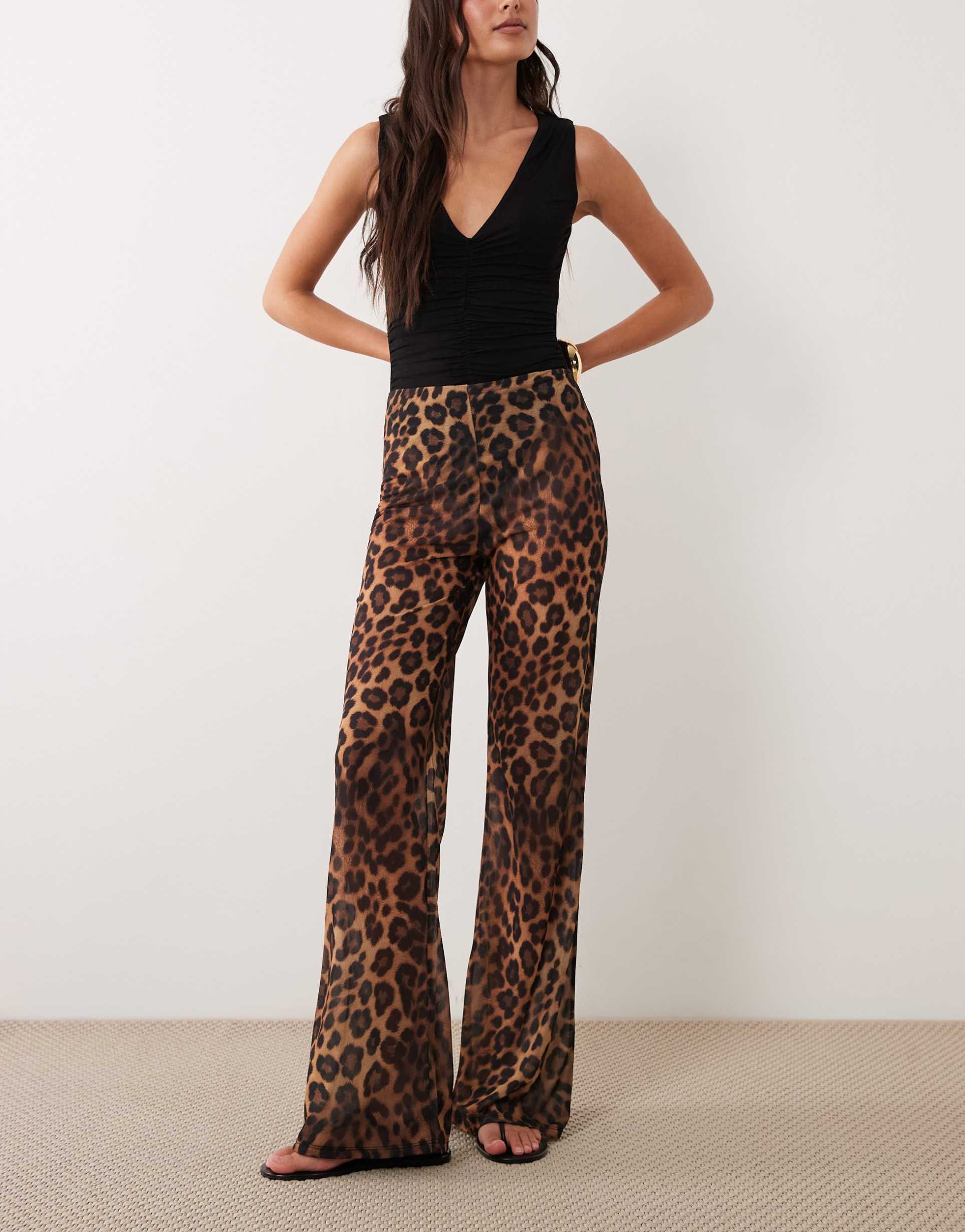 asos design flared sheer mesh pants in leopard print