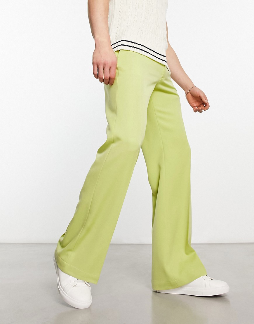 ASOS DESIGN flared smart trousers in lime green