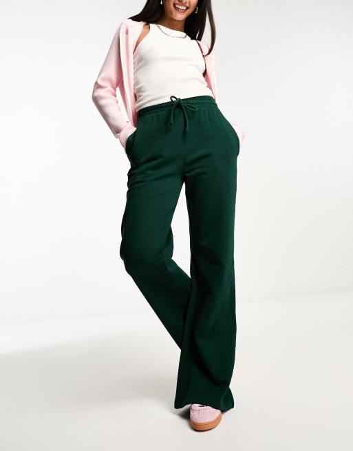 ASOS DESIGN flared sweatpants in forest green