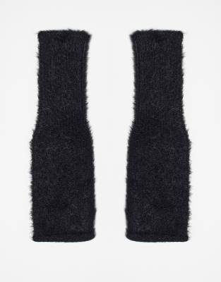 ASOS DESIGN - Flauschige, fingerlose Langarm-Handschuhe in Schwarz