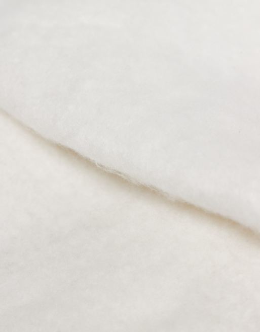 ASOS DESIGN woven fluffy tassel scarf in winter white