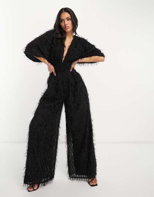 ASOS DESIGN – Flauschiger Jumpsuit in Schwarz mit tiefem Ausschnitt und weitem Bein