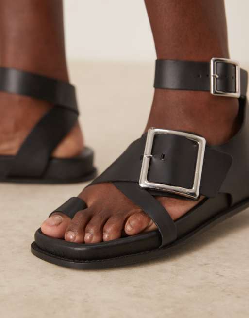 ASOS DESIGN Flawless leather toe loop footbed sandals in black ASOS