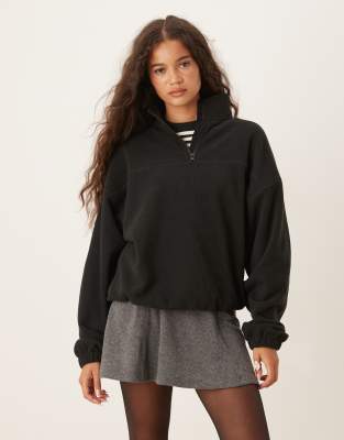 ASOS DESIGN - Fleece-Sweatshirt in Schwarz mit kurzem Reißverschluss