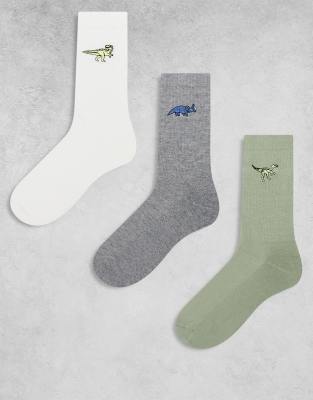 ASOS DESIGN – Flerfärgade strumpor med broderade dinosaurier, 3-pack