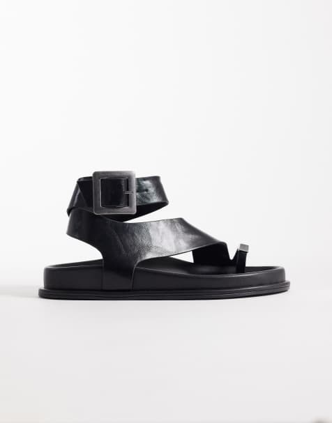 ASOS DESIGN Fletcher footbed sandals with metal toe loop in black - view 1