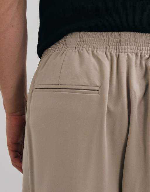 ASOS DESIGN - FlexMax™ - Nette broek met wijde pijpen en elastische taille in stone, 4 van 5
