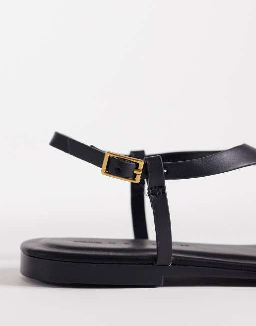 ASOS DESIGN – Flint – Zehenstegsandalen in Schwarz mit abstraktem Metalldetail, 3 von 4