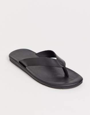 black leather flip flops