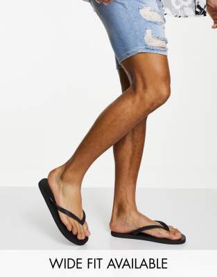 ASOS DESIGN flip flops in black