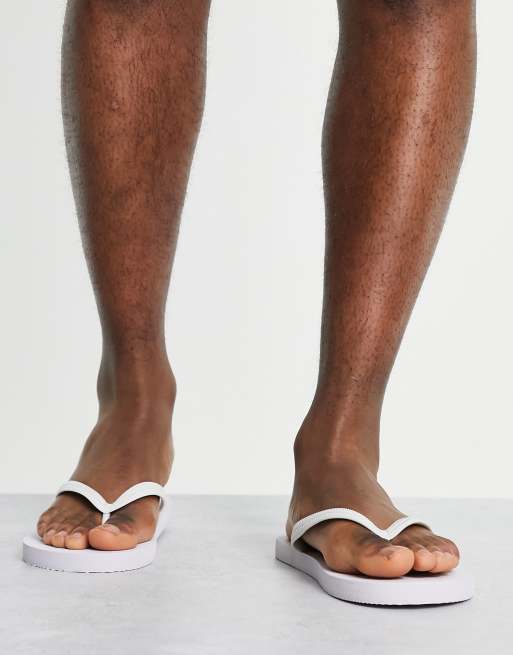 ASOS DESIGN flip flops in white