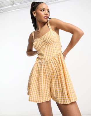 ASOS DESIGN flippy skater playsuit in mustard gingham - ASOS Price Checker