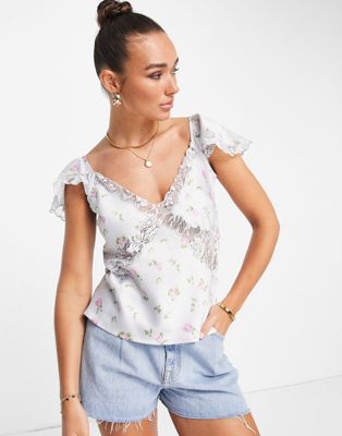 ASOS DESIGN flippy top with lace fluted sleeve and seam detail in ditsy print