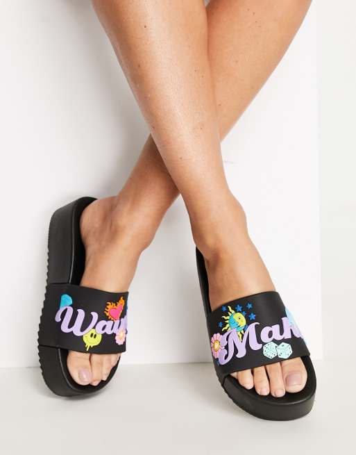 ASOS DESIGN - Flirty - Sorte flatform-badesandaler til poolen med 'Make Waves'-design