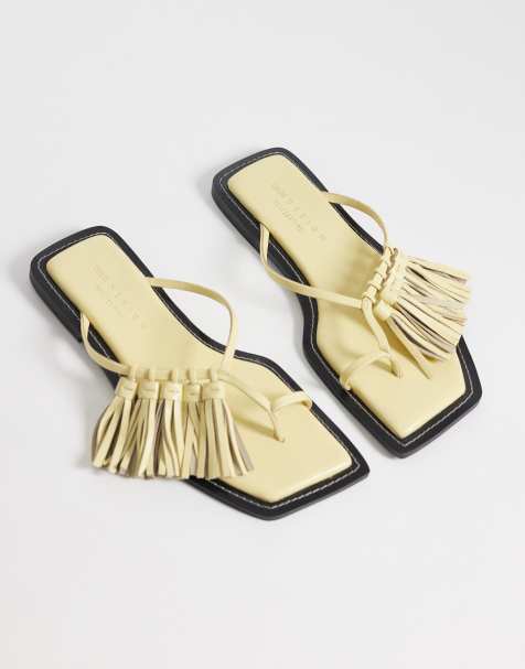 ASOS DESIGN – Flit – Hochwertige Ledersandalen in Pastinakengelb mit Quasten - view 1