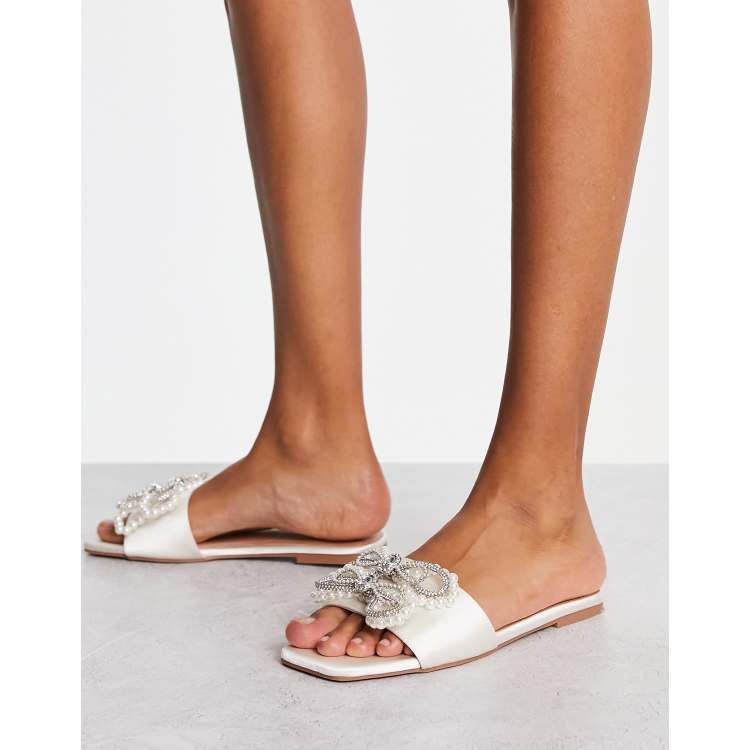 ASOS DESIGN Flo embellished bow flat sandal in ivory