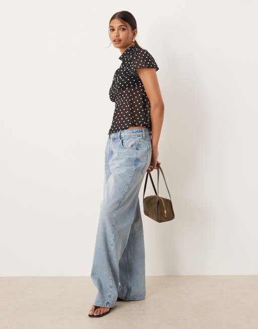 ASOS DESIGN floaty mesh flutter sleeve top with tie back detail in black polka dot